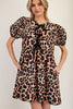 Front view of animal print dress with bows