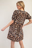 Back view of animal print dress with bows