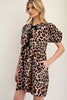 Side view of animal print dress with bows